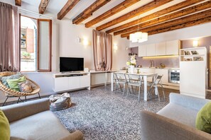 Apartment, Canal View | Living area | 35-inch TV with digital channels