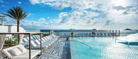 2 outdoor pools, pool umbrellas, sun loungers