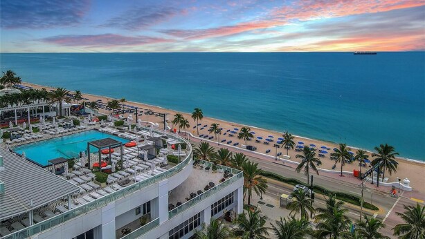 A resort with a pool, beach, and ocean view. - Lux Two BR Suite at W Fort Lauderdale (Fort Lauderdale)
