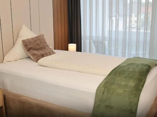 1 chambre, fer et planche à repasser, Wi-Fi, draps fournis