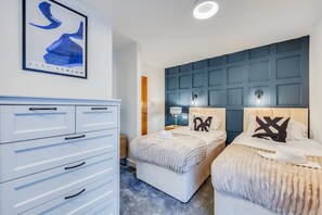 3 bedrooms, desk, iron/ironing board, travel cot