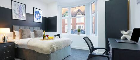 4 bedrooms, desk, iron/ironing board, travel crib