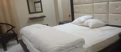 Chambre Double Deluxe | Chambres insonorisées, fer et planche à repasser, Wi-Fi gratuit