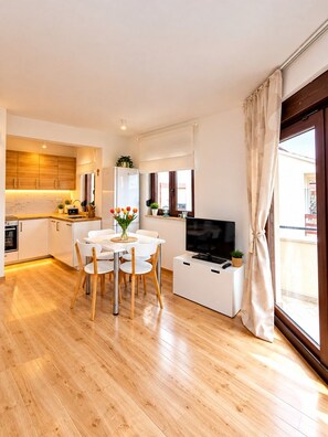 A modern apartment with a kitchen, dining area, and living space. - Holiday Home Ira with Pool and BBQ, Family Friendly, WiFi, Parking, Pets Allowed (Krk)