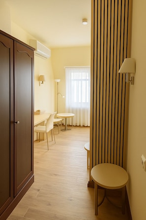 Premium bedding, desk, laptop workspace, free WiFi