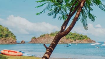 On the beach, sun-loungers, beach towels