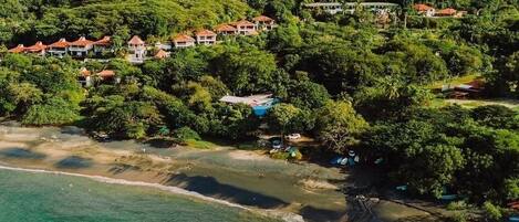 On the beach, sun loungers, beach towels
