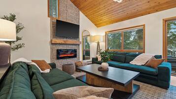 Smart TV, fireplace, table football, books