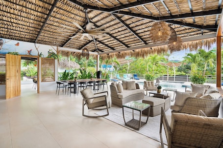 Outdoor dining. Resort-Style Stay w King Suite + Pool - Near Beach