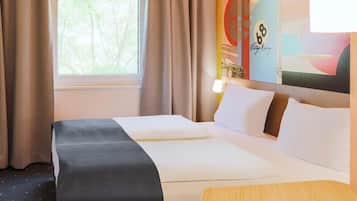 Habitación doble | Cortinas blackout, insonorización y wifi gratis