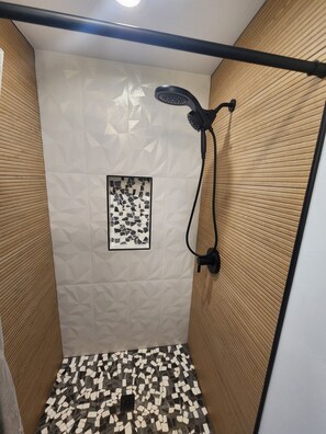 Shower, jetted bath, towels, soap