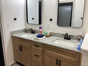 Hair dryer, towels, soap, toilet paper