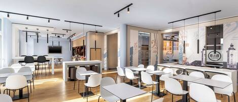Un moderno vestíbulo de hotel con zona de bar, asientos y una pantalla grande.