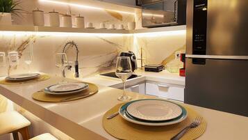 Basic Apartment | Private kitchen | Microwave, stovetop, coffee/tea maker, toaster