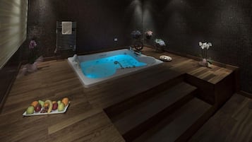 President Suite | Bathroom | Shower, hair dryer, slippers, towels