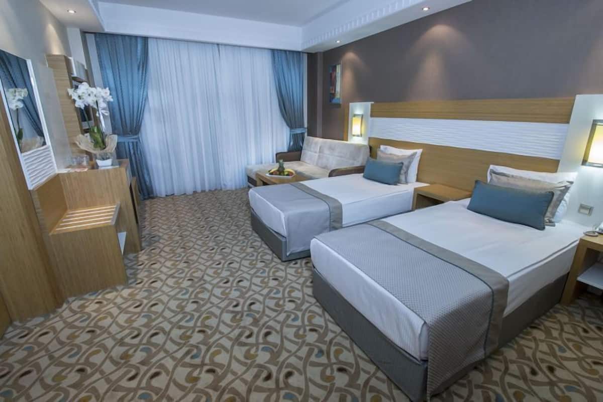 Family Room, Pool View | In-room safe, blackout drapes, soundproofing, free WiFi