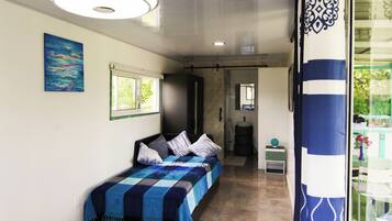 Bungalou, diversos llits | 1 dormitori, espai de treball apte per a portàtils i wifi gratuïta