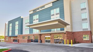A modern hotel with a flat roof, large windows, and a prominent signage for 'SPRINGHILL SUITES.' - SpringHill Suites by Marriott St. Louis Chesterfield (Chesterfield)