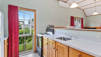 Fridge, microwave, toaster, cookware/dishes/utensils