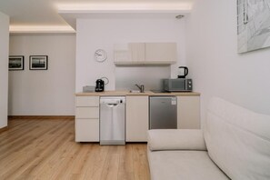 Deluxe Apartment, Balcony, Courtyard View | Private kitchenette | Coffee/tea maker, electric kettle - TOTU Home Browar Gdański Apartment  (Gdansk)