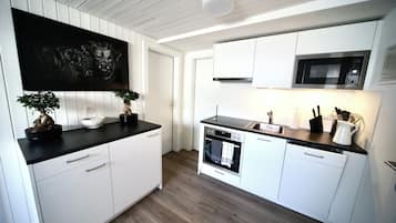 Departamento tradicional, 2 habitaciones | Cocineta privada | Refrigerador, lavavajillas, tetera eléctrica y periquera