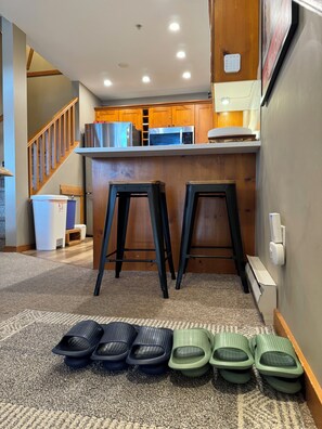 Enjoy cooking in this well-equipped kitchen with an oven, refrigerator, and microwave.