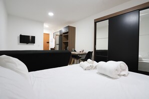 1 bedroom, desk, bed sheets