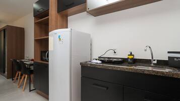 Fridge, microwave, stovetop, cookware/dishes/utensils