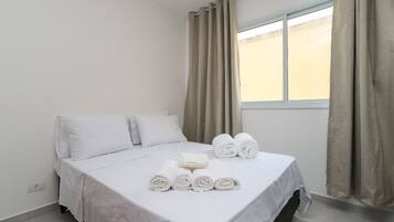 1 bedroom, desk, bed sheets