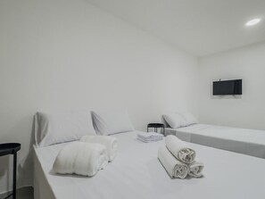 1 bedroom, desk, bed sheets