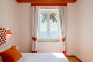 2 bedrooms, in-room safe, iron/ironing board, travel cot