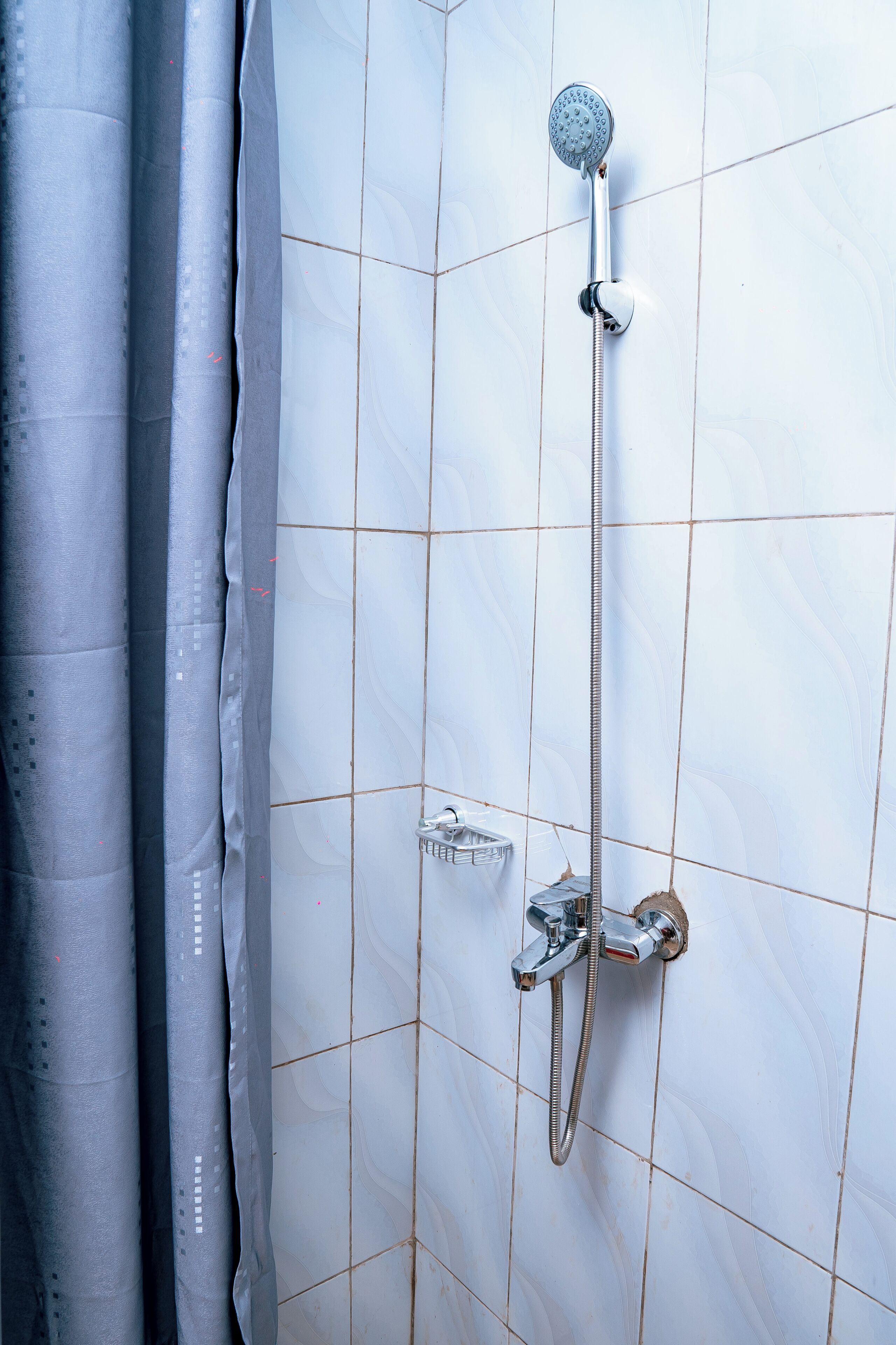 Shower, free toiletries, slippers, towels