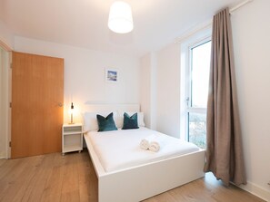 2 dormitorios, tabla de planchar con plancha, wifi gratis y ropa de cama
