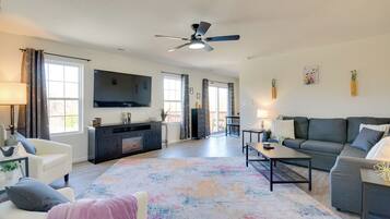 TV, fireplace, books