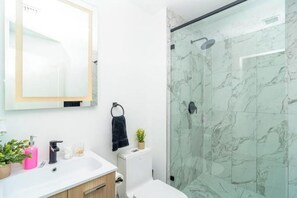 Hair dryer, towels, soap, toilet paper