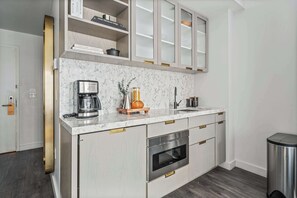 Fridge, microwave, coffee/tea maker, toaster