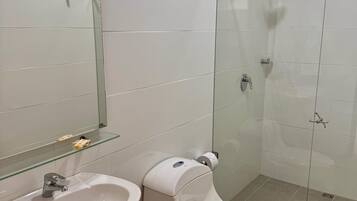 Shower, jetted tub, towels, soap