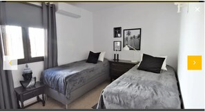 2 slaapkamers, een kluis op de kamer, een strijkplank/strijkijzer