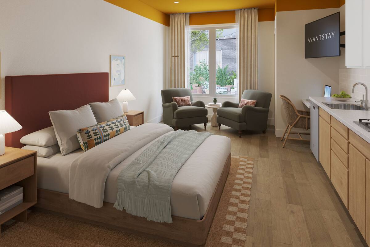 Premium bedding, laptop workspace, blackout curtains, soundproofing