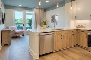 1 Bedroom Suite w/ Balcony | Private kitchen | Full-size fridge, microwave, oven