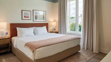 2 bedrooms, premium bedding, laptop workspace, blackout curtains