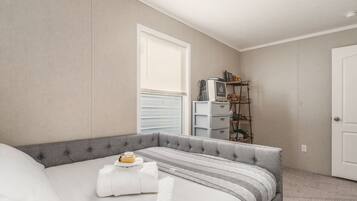 2 dormitorios, tabla de planchar con plancha, wifi gratis y ropa de cama