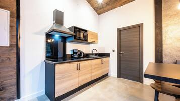 Fridge, microwave, stovetop, coffee/tea maker