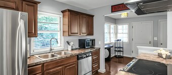 Stay in a charming 2-bedroom house in Omaha with WiFi, AC, and a peaceful vibe.