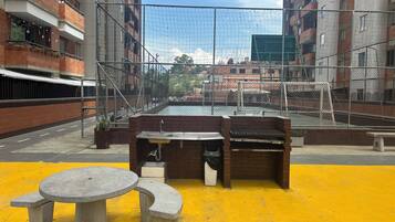 Flat-screen TV, video-game console