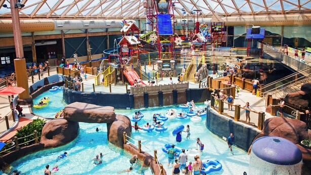 An indoor water park with multiple water slides, pools, and play areas. - Slope View Chalet Hot Tub, Firepit, Family Fun (McGaheysville)