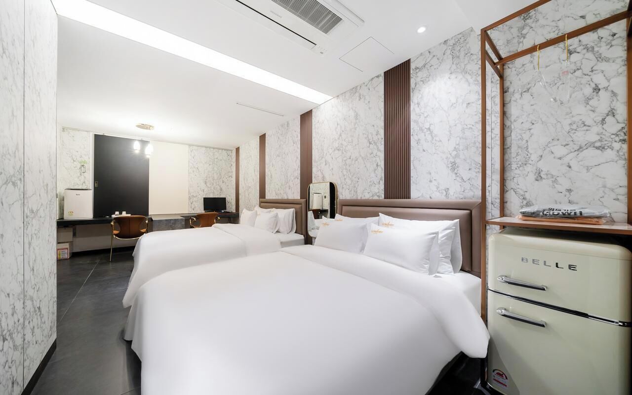Desk, laptop workspace, free WiFi, bed sheets