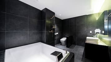 Hair dryer, slippers, towels, shampoo