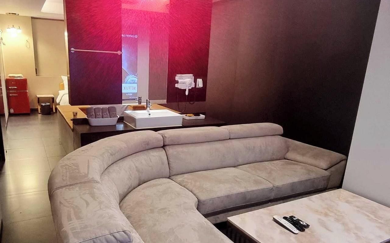 Desk, laptop workspace, free WiFi, bed sheets