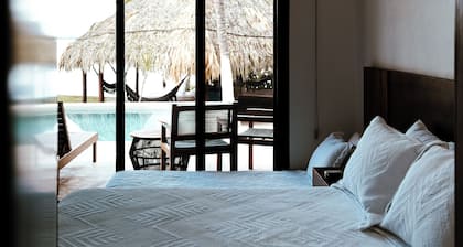 Casa Xchel in front of the bay, pool, jacuzzi and deck.